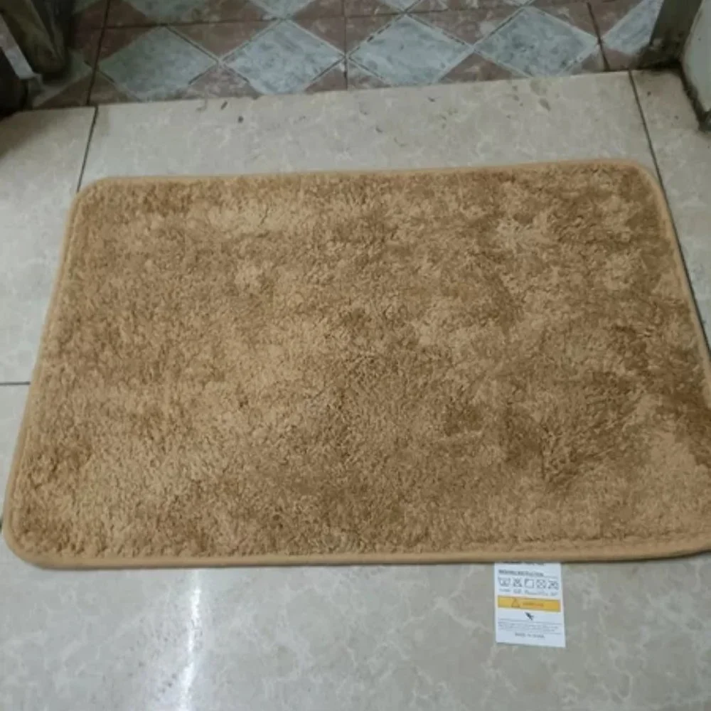 Bathroom and kitchen floor with blankets